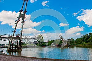 River, where a new bridge. The Astana, or Governor`s Palace. Kuching. Sarawak. Malaysia. Borneo