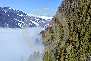 The river of white fog in mountains.Alpine Alps mountain landscape at Tirol, Top of Europe