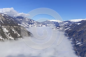 The river of white fog in mountains.Alpine Alps mountain landscape at Tirol, Top of Europe