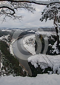 River in winter at the Bastei bridge in saxon switzerland national park, Elbe Sandstone Mountains, Germany.