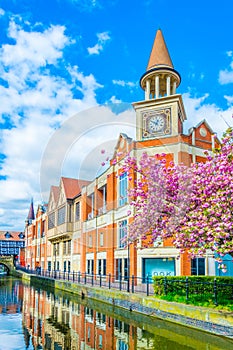 River Witham passes old brick buildings in central Lincoln, England