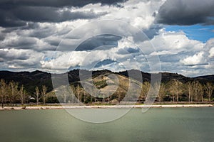 Riverbank of Danube with dramatic clouds