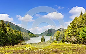 Riverbank with mountains