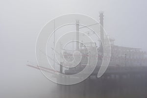 Riverboat on the Mississippi shrouded in fog