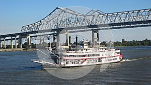 Riverboat the Natchez cruising down on the Mississippi River in New Orleans