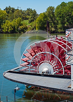 Riverboat Paddle Wheel in a River