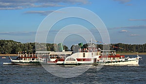 Riverboat with paddle wheels