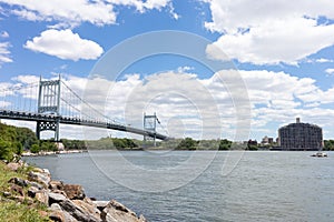Riverfront of Randalls and Wards Islands with the Triborough Bridge over the East River in New York City photo