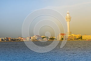 Riverfront view of Samut Prakan city hall with new observation tower and boat pier. Samut Prakan is at the mouth of the Chao