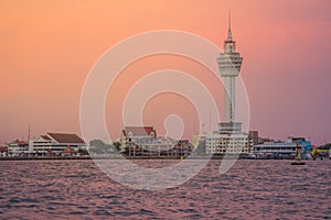 Riverfront view of Samut Prakan city hall with new observation tower and boat pier. Samut Prakan is at the mouth of the Chao