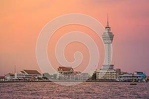 Riverfront view of Samut Prakan city hall with new observation tower and boat pier. Samut Prakan is at the mouth of the Chao