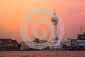 Riverfront view of Samut Prakan city hall with new observation tower and boat pier. Samut Prakan is at the mouth of the Chao