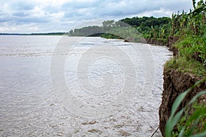 Rivers of Bangladesh. Broken river bank. The landscape of beautiful rivers in Bangladesh