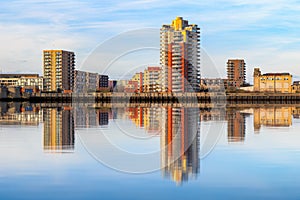 Riverside apartment next to Thames Barrier with its reflection f