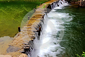 The riverside and bridge in The Xijiang Qianhu Miao village