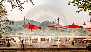 Riverside Mekong river restaurant in chiang rai ,Thailand in summer It`s very hot . photo