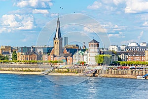 Riverside of Rhein in Dusseldorf with Saint Lambertus church, Germany