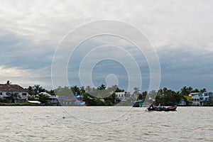 Riverside stilt houses in the Mekong Delta