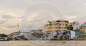Riverside stilt houses in the Mekong Delta