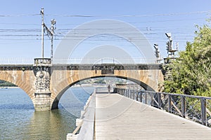 Riverside walkway and railway border bridge in Hendaye in the French Basque Country