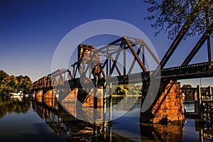 Riverwalk Old functioning train bridge over the Savannah river side view