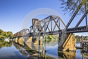 Riverwalk Old functioning train bridge over the Savannah river side view