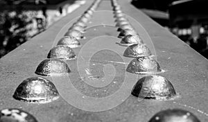 Rivet bridge detail black and white photo