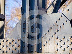 rivet in old metal structure of a bridge. Engineering concept