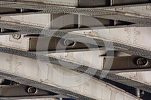 Riveted metal from bridge, textural background