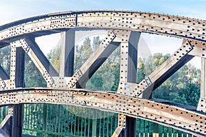 Riveted old bridge arch