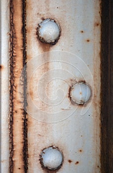 Riveted rusty metal texture background