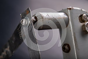 Riveting two pieces of metal sheet. Connecting steel with rivets