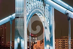 Rivets, Steel, and Light on Bridge in Tokyo