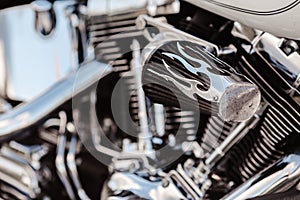 Rivne, Ukraine - September 23, 2019: Harley-Davidson Fat Boy motorcycle detail.  Motorcycle engine exhaust pipes. Close up of a cl