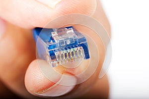 RJ 45 network cable on human hand