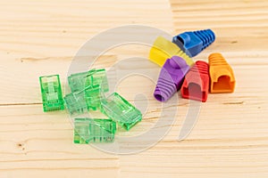 Rj 45 wire connector transparent green and cap multi-colored red, yellow