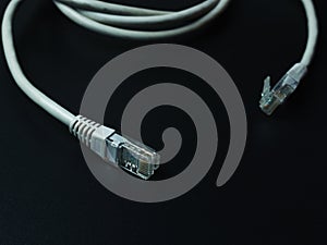 Rj45 cable on dark background.