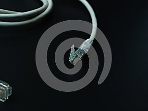 Rj45 cable on dark background.