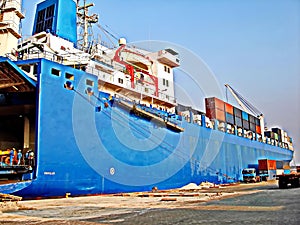 Ro-Ro is a specialized vessel for transporting vehicles, containers and other cargoes in the port and on the high seas.
