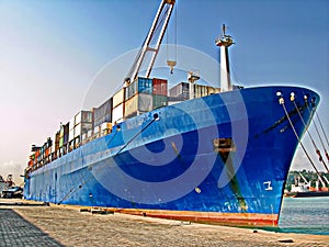 Ro-Ro is a specialized vessel for transporting vehicles, containers and other cargoes in the port and on the high seas.