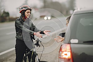 Road accident with cyclist man driver and car