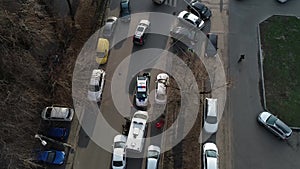 Road accident with two car collision from height top view