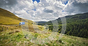 Road across scenic valley in North Wales