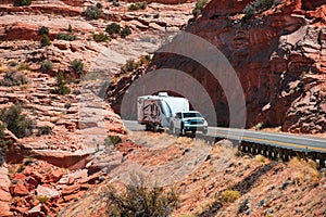 Road against the high rocks. Exploring the USA. Holiday trip vacation. Motorhome, RV on a road. Caravan or recreational