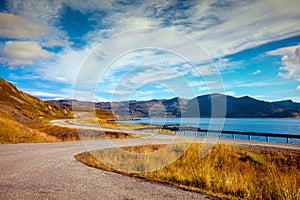 The road along the fjord on the island of Mageroya. Road to Nordkapp, Norway