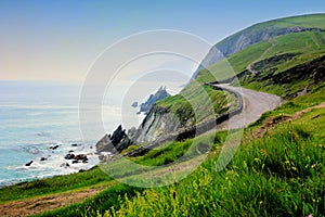 Road along the scenic coast of western Ireland. Slea Head, Dingle peninsula, County Kerry.