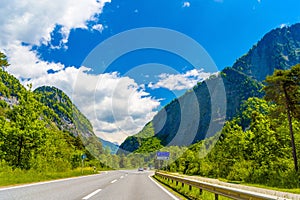 Road among Alps mountains, Klosters-Serneus, Davos, Graubuenden Switzerland