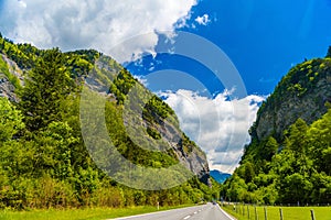 Road among Alps mountains, Klosters-Serneus, Davos, Graubuenden Switzerland