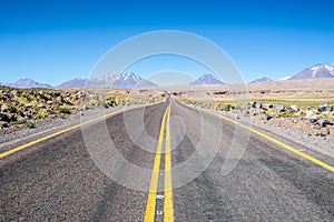 Road into the Atacama Desert. Barren rocky landscape, arid mountains and hills in the San Pedro de Atacama area.