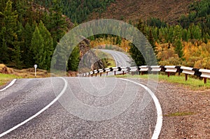 Road in autumn mountains